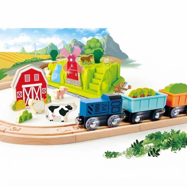Assembled hape train set layout featuring a farm theme, tracks, and a train