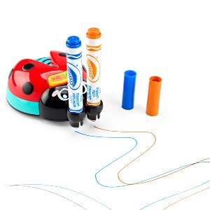 Close-up of the red and blue ladybug doodlebug toy drawing curved lines with a blue marker, showing the resulting artwork